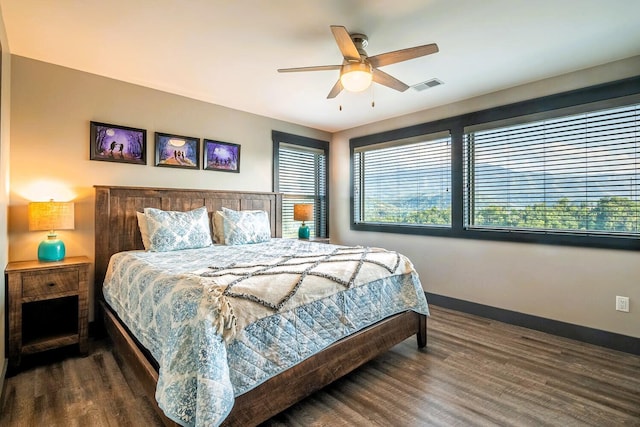 907 Village Loop Rd, Gatlinburg, TN 37738 - bedroom featuring ceiling fan and dark wood-type flooring