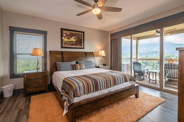 907 Village Loop Rd, Gatlinburg, TN 37738 - bedroom featuring access to outside, a mountain view, ceiling fan, and dark hardwood / wood-style floors