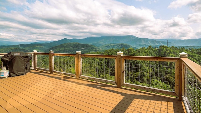 907 Village Loop Rd, Gatlinburg, TN 37738 - wooden terrace featuring a mountain view and a grill