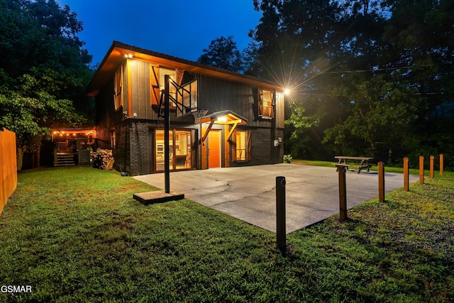 contemporary home with a lawn