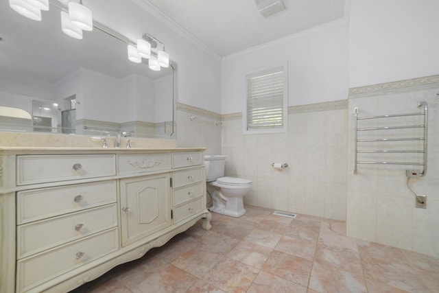 bathroom with radiator, toilet, vanity, tile walls, and ornamental molding