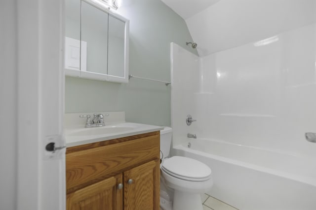 full bathroom with tile patterned flooring, vaulted ceiling, toilet, vanity, and bathtub / shower combination