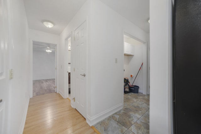 corridor featuring light hardwood / wood-style flooring