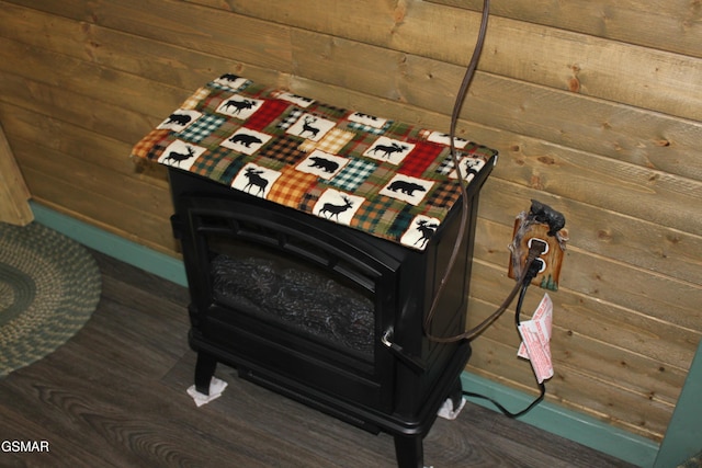 details with wood walls and a wood stove