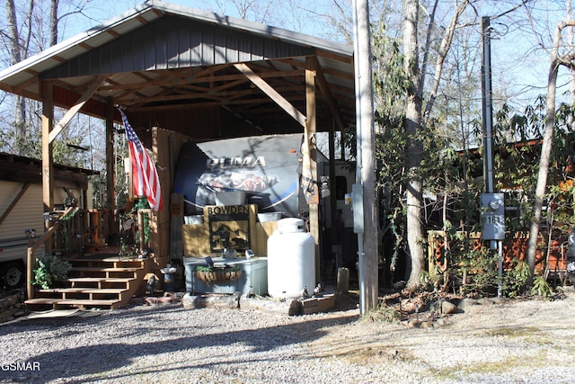 exterior space featuring a carport