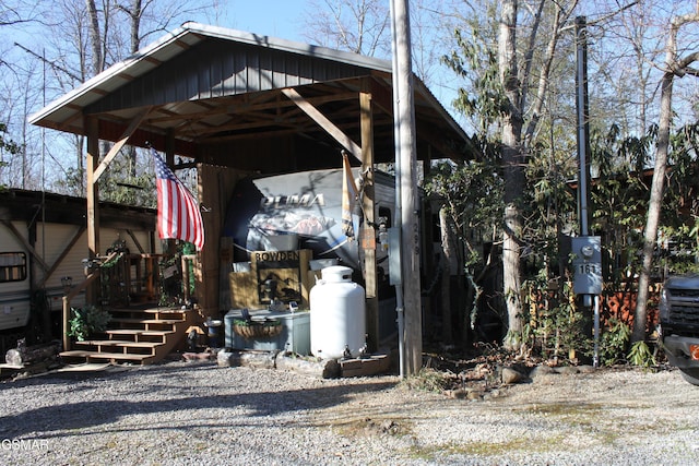 exterior space with a carport