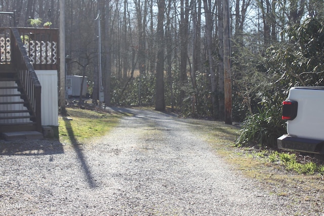 view of road featuring stairs