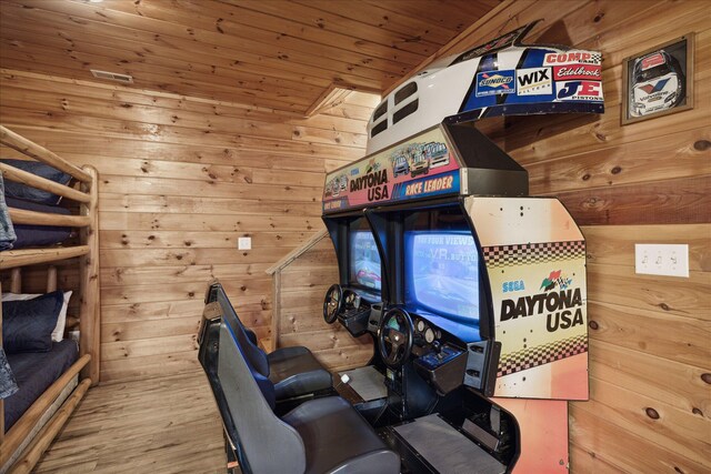 playroom featuring wood ceiling, lofted ceiling, and wood walls