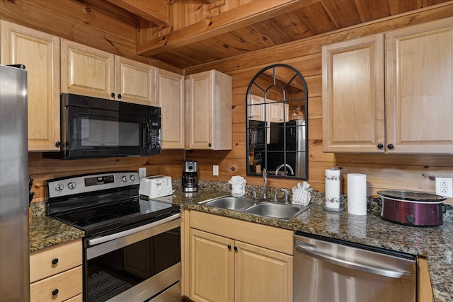 kitchen with appliances with stainless steel finishes, wood ceiling, wooden walls, sink, and light brown cabinets