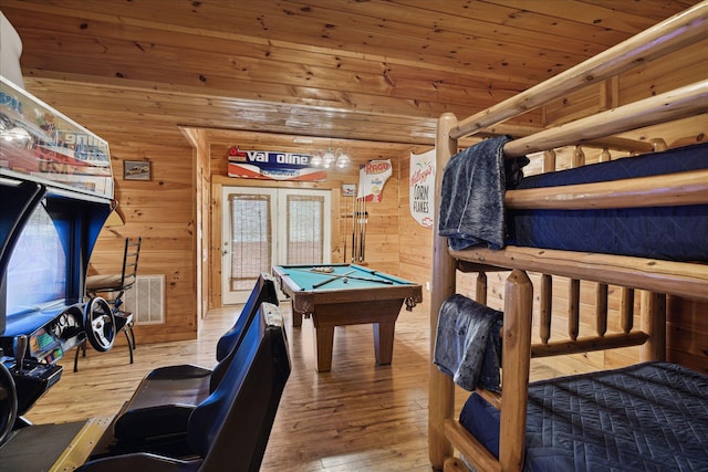 rec room with wooden walls, wood-type flooring, wood ceiling, and pool table