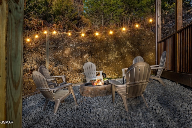 view of patio / terrace featuring an outdoor fire pit