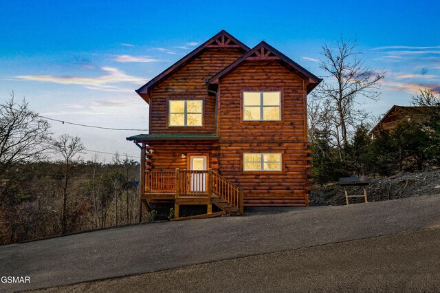 view of log-style house