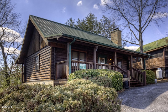 log home with a porch