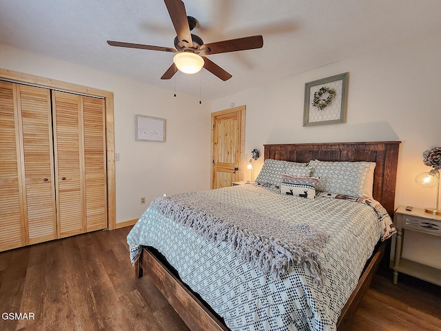 bedroom featuring ceiling fan, wood finished floors, a closet, and baseboards