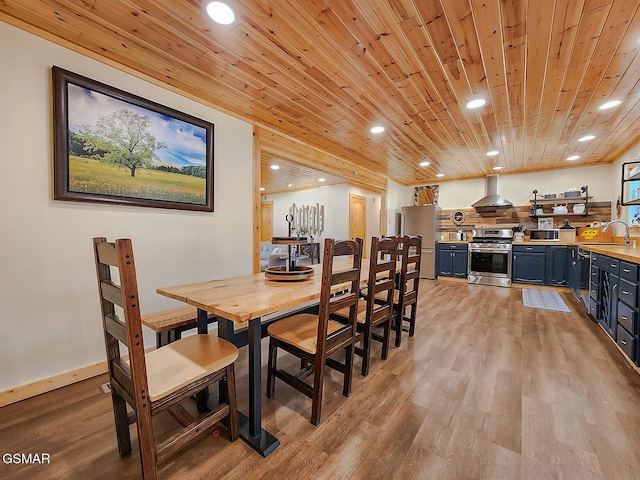 dining space featuring recessed lighting, wood ceiling, baseboards, and light wood finished floors