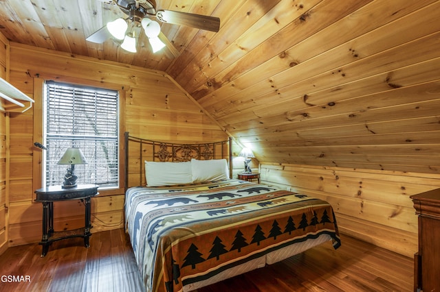 bedroom featuring lofted ceiling, wood ceiling, wood walls, and hardwood / wood-style floors