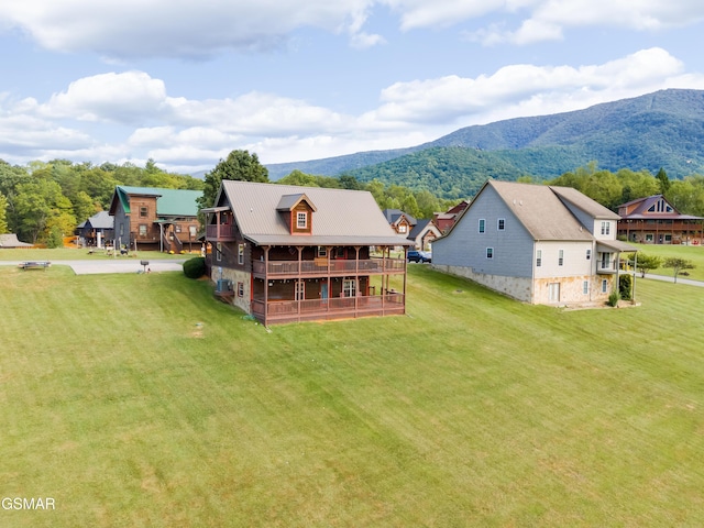 drone / aerial view featuring a mountain view