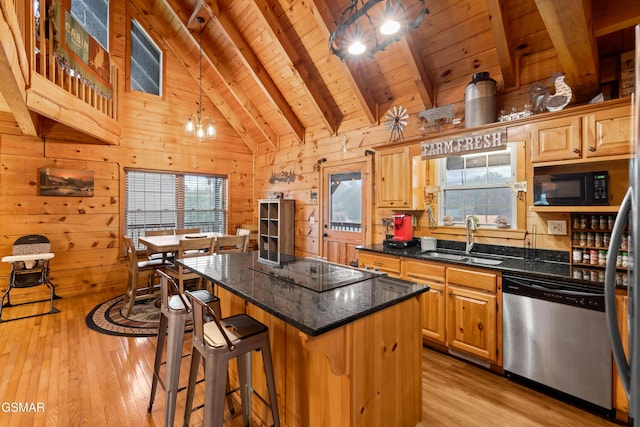 kitchen featuring sink, wooden ceiling, beamed ceiling, a kitchen island, and black appliances