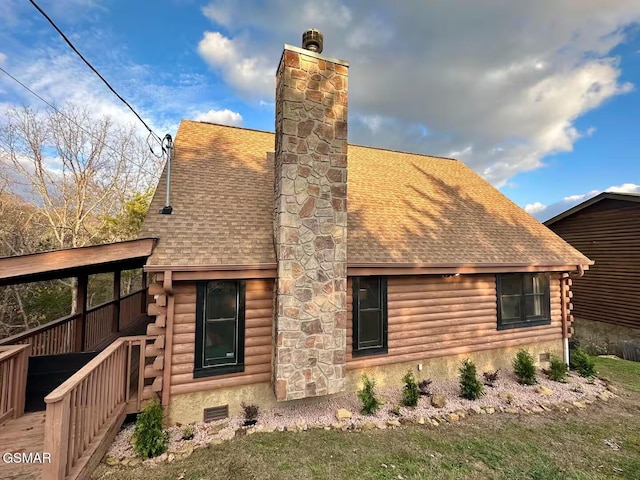 2221 Eagle Feather Dr, Sevierville, TN 37876 - back of house featuring log siding, roof with shingles, crawl space, and a chimney