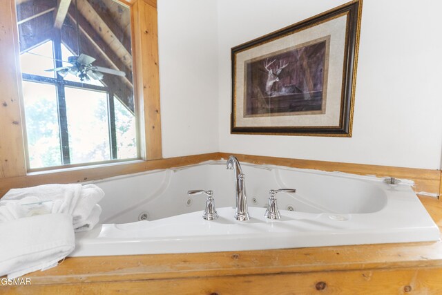 1251 Bear Cub Way, Gatlinburg, TN 37738 - full bathroom featuring a healthy amount of sunlight and a tub with jets