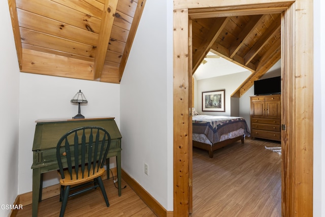 1251 Bear Cub Way, Gatlinburg, TN 37738 - bedroom with vaulted ceiling, baseboards, and wood finished floors