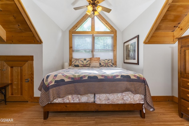 1251 Bear Cub Way, Gatlinburg, TN 37738 - bedroom featuring light wood-type flooring, lofted ceiling, baseboards, and ceiling fan