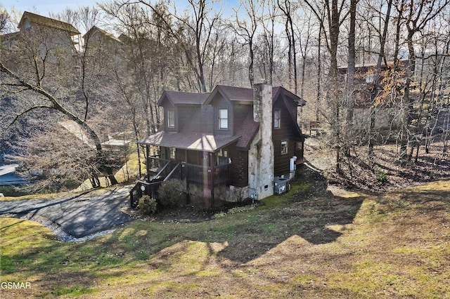 2904 Peregrine Way, Pigeon Forge, TN 37863 - view of front facade featuring a chimney and a porch