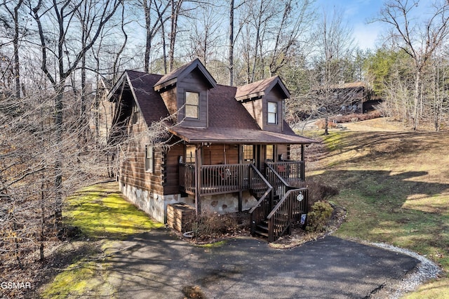 2904 Peregrine Way, Pigeon Forge, TN 37863 - view of front facade featuring covered porch, driveway, and stairway