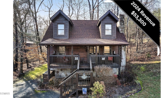 2904 Peregrine Way, Pigeon Forge, TN 37863 - view of front of home with a porch, stairs, and roof with shingles