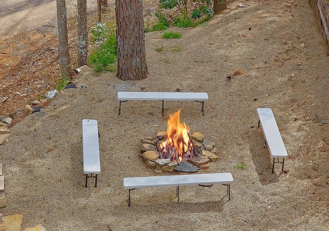 exterior details with a fire pit