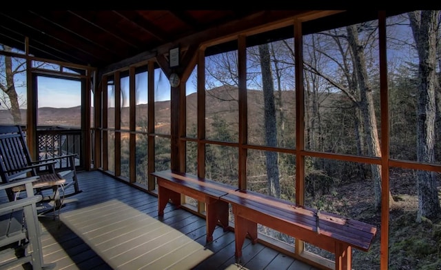 3831 Glenview Way, Sevierville, TN 37862 - sunroom / solarium featuring a deck with mountain view, wood-type flooring, and a wall of windows