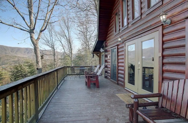 3831 Glenview Way, Sevierville, TN 37862 - wooden terrace with french doors and a mountain view
