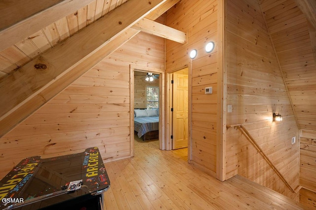 833 Park Dr, Gatlinburg, TN 37738 - additional living space featuring wood walls, beam ceiling, and light wood finished floors