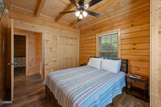 833 Park Dr, Gatlinburg, TN 37738 - bedroom featuring beamed ceiling, wooden walls, and wood ceiling