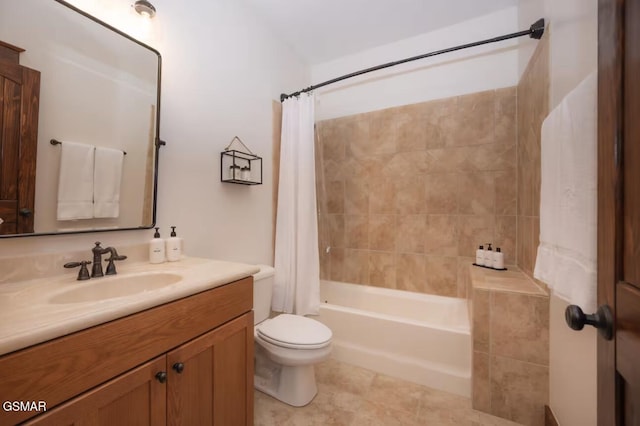 full bathroom featuring vanity, shower / bath combination with curtain, tile patterned floors, and toilet