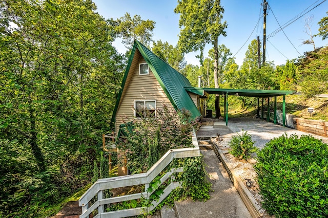 exterior space featuring a carport