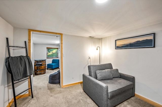 sitting room featuring carpet