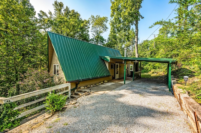 view of outdoor structure with a carport