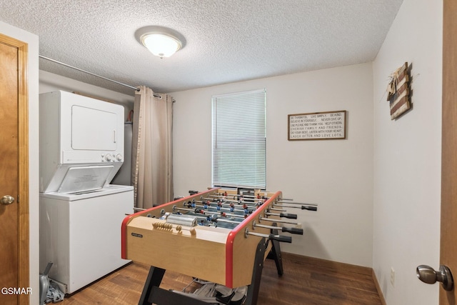2108 Redmond Way, Sevierville, TN 37876 - game room featuring estacked washer and dryer, wood finished floors, and a textured ceiling