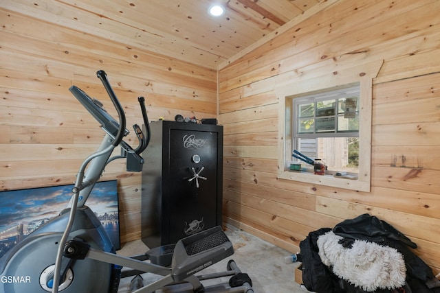 exercise room with wooden walls and wooden ceiling