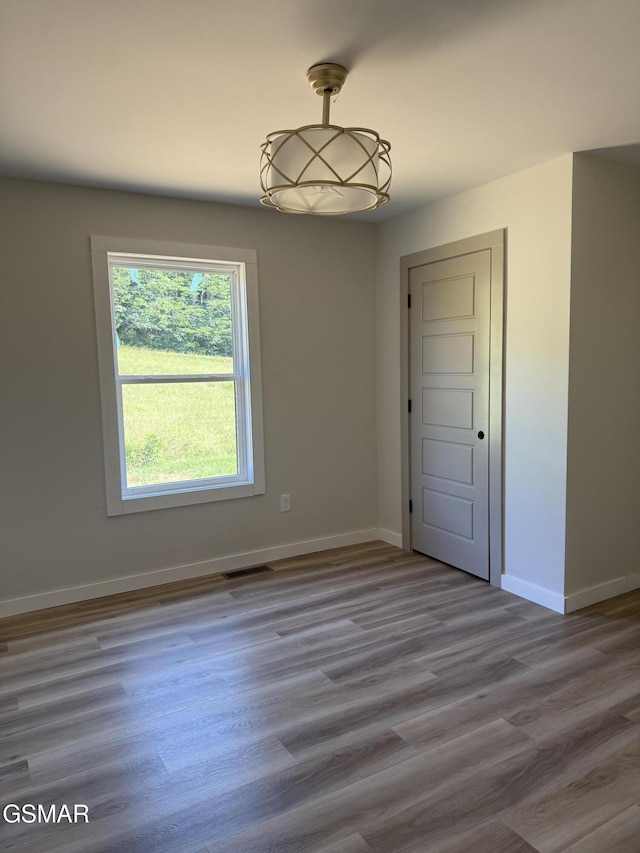 1607 Tranquility Ridge Rd, Newport, TN 37821 - spare room featuring baseboards and wood finished floors