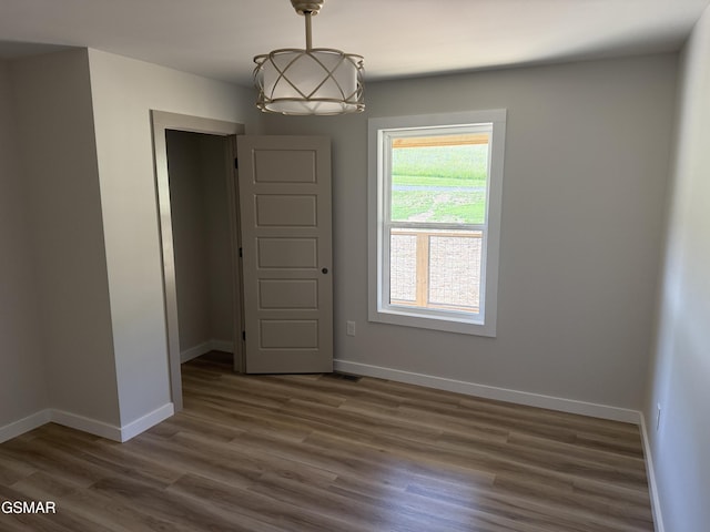 1607 Tranquility Ridge Rd, Newport, TN 37821 - spare room with baseboards and dark wood-type flooring