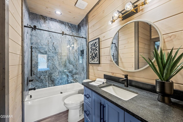 full bathroom with toilet, wood ceiling, tub / shower combination, vanity, and wood walls