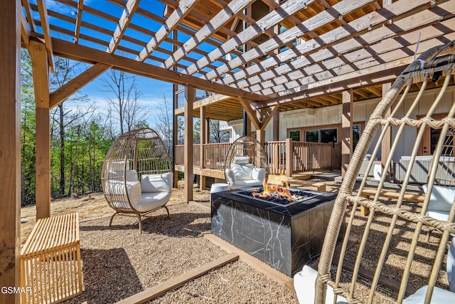 view of patio / terrace featuring a fire pit