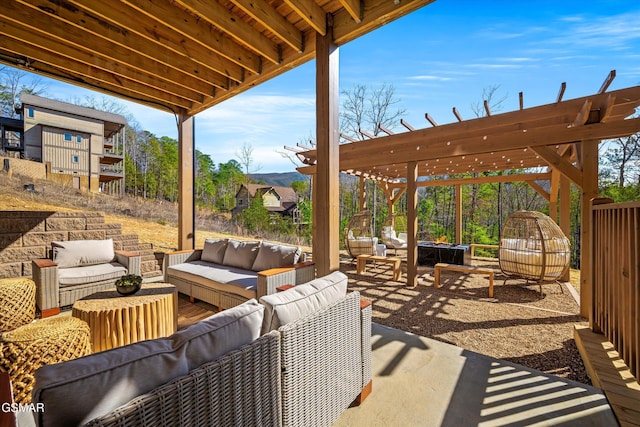 view of patio featuring an outdoor living space and a pergola