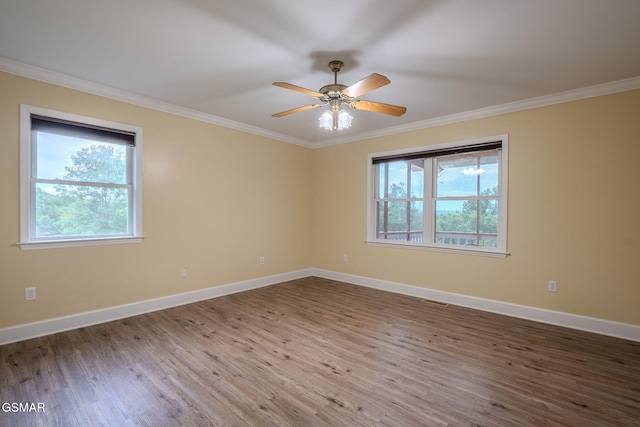 1110 Hide Away Ln, Kodak, TN 37764 - empty room featuring crown molding, wood finished floors, and ceiling fan