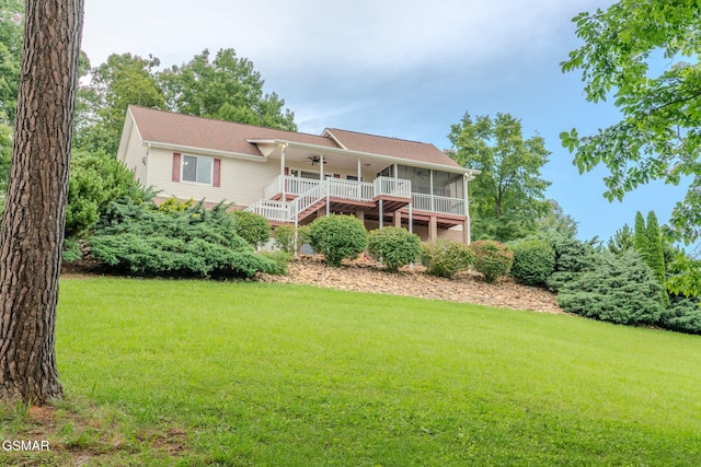 1110 Hide Away Ln, Kodak, TN 37764 - rear view of property featuring a ceiling fan, a sunroom, a yard, and stairway