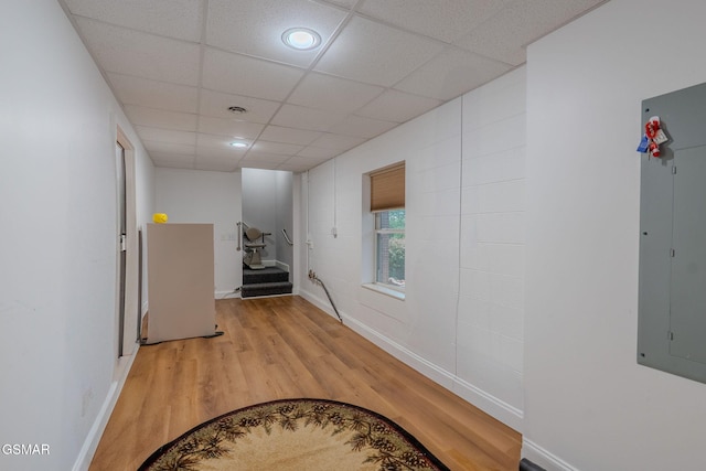 1110 Hide Away Ln, Kodak, TN 37764 - corridor with electric panel, light wood-style flooring, and a drop ceiling