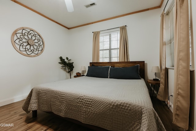 1730 Red Fox Ridge Way, Sevierville, TN 37862 - bedroom featuring ornamental molding, wood finished floors, and a ceiling fan