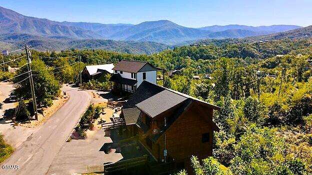 710 Village Loop Rd, Gatlinburg, TN 37738 - view from above of property with a mountainous background and a forest